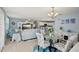 Spacious open floor plan combines living, dining, and kitchen areas, perfect for entertaining at 1728 Morelos Rd, The Villages, FL 32159