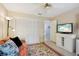Cozy living area featuring comfortable seating, soft lighting, and a decorative rug on the floor at 1728 Morelos Rd, The Villages, FL 32159