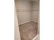 Walk-in closet with carpet and wire shelving at 1808 Carnostie Rd, Winter Haven, FL 33884