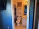 The shared bathroom of the themed bedroom features a standup shower and a standard toilet at 206 Orchid Dr, Davenport, FL 33897