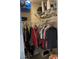 Organized walk-in closet with shelving providing ample storage for clothes, bags and containers at 206 Orchid Dr, Davenport, FL 33897