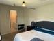 Comfortable main bedroom providing access to a private bathroom, enhancing privacy at 206 Orchid Dr, Davenport, FL 33897