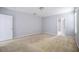 Neutral bedroom with carpet, white trim, and plentiful natural light at 236 Savannah Preserve Loop, Davenport, FL 33837