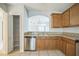 Kitchen featuring stainless steel appliances, granite countertops, and a pantry closet at 236 Savannah Preserve Loop, Davenport, FL 33837