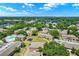 Community aerial view showcasing the layout with a pool, playground, mature trees, and well-maintained grounds at 2423 Branch Way # 207, Maitland, FL 32751