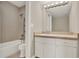 Bathroom features a vanity with cabinets, and a combined bathtub and shower at 2423 Branch Way # 207, Maitland, FL 32751