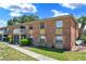 A charming brick condo with a second-floor balcony and beautiful landscaping at 2423 Branch Way # 207, Maitland, FL 32751