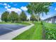 Well-maintained grounds with sidewalks and plenty of greenery create a welcoming neighborhood environment at 2530 Maneshaw Ln, Kissimmee, FL 34747