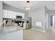 Well-equipped kitchen with stainless steel appliances, granite countertops, and ample cabinet space at 2530 Maneshaw Ln, Kissimmee, FL 34747