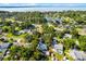 An aerial view of property near lake and conservation area at 2711 Bayview Dr, Eustis, FL 32726