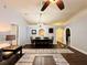 Spacious living room with hardwood floors, ceiling fan, and archways to other rooms at 2850 Aragon Ter, Lake Mary, FL 32746