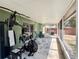 Covered patio with exercise equipment and plenty of room for outdoor activities at 2850 Aragon Ter, Lake Mary, FL 32746