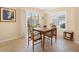 Bright breakfast nook with tile flooring and sliding glass door to the exterior at 3008 Bridgefield Ct, The Villages, FL 32162