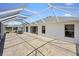 Covered patio showing the transition to indoor living space with sliding glass doors at 3008 Bridgefield Ct, The Villages, FL 32162