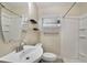 This bathroom features a shower and a single sink at 315 W 11Th Ave, Mount Dora, FL 32757