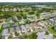 Aerial view of a residential area with a golf course at 412 Hildalgo Dr, The Villages, FL 32159