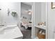 A vanity in a bathroom leading to a bedroom at 412 Hildalgo Dr, The Villages, FL 32159
