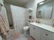 Cozy bathroom with a shower, bathtub and a vanity at 412 Hildalgo Dr, The Villages, FL 32159