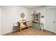 Dining area features a hutch with glass doors and casual table setting at 412 Hildalgo Dr, The Villages, FL 32159