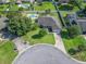 An aerial view showcases the property's well-manicured lawn and neighborhood, highlighting its prime location at 4730 Se 31St St, Ocala, FL 34480