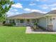 Charming home with a manicured lawn, inviting porch, and well-maintained landscaping at 4730 Se 31St St, Ocala, FL 34480