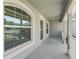 Inviting front porch with ample space, stylish windows, and charming architectural details at 4730 Se 31St St, Ocala, FL 34480