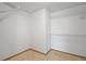 Walk-in closet with white walls, neutral carpet, and wire shelving at 501 Cherry Tree St, Eustis, FL 32726