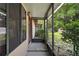Covered porch offers a shaded entrance, enhancing curb appeal at 501 Cherry Tree St, Eustis, FL 32726