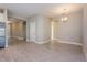 Spacious living room with neutral paint, and wood-look tile floors at 5036 Balsam Falls Rd, Deland, FL 32724