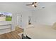 Bedroom with ensuite access and access to dining room at 5944 Hickey Way, The Villages, FL 32163
