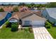 Charming home with solar panels on a well-manicured lot in a quiet neighborhood at 735 Palma Dr, Lady Lake, FL 32159