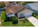 Beautiful home with solar panels in a well-kept community, close to neighborhood amenities at 735 Palma Dr, Lady Lake, FL 32159