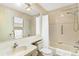 Bathroom featuring a shower-tub combo with an extended shower head and large mirror at 735 Palma Dr, Lady Lake, FL 32159