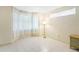 Bedroom featuring bright windows, tile floors, and natural light at 735 Palma Dr, Lady Lake, FL 32159