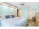 Bedroom with custom built-ins around the bed and a ceiling fan for added comfort at 735 Palma Dr, Lady Lake, FL 32159