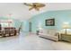 Spacious living room with tile floors, ceiling fan and view of the dining area at 735 Palma Dr, Lady Lake, FL 32159