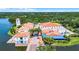 Stunning aerial view featuring the community's architecture and waterfront setting at 780 Mystic Hill Ct, Kissimmee, FL 34759