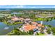 Scenic aerial perspective showcasing the community clubhouse complex and surrounding homes at 780 Mystic Hill Ct, Kissimmee, FL 34759