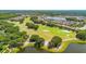 Picture-perfect golf course aerial view, framed by scenic residences and verdant landscapes at 780 Mystic Hill Ct, Kissimmee, FL 34759