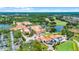 Wonderful aerial view of the community's amenities and golf course with lush landscaping at 780 Mystic Hill Ct, Kissimmee, FL 34759