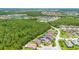 Picturesque community with stunning lake views, lush greenery, and beautifully maintained homes, creating a serene and inviting neighborhood ambiance at 780 Mystic Hill Ct, Kissimmee, FL 34759