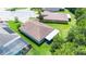 Aerial view of a well-maintained home with lush green lawn and landscaping at 780 Mystic Hill Ct, Kissimmee, FL 34759