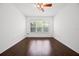 Spacious bedroom featuring a large window and ceiling fan at 780 Mystic Hill Ct, Kissimmee, FL 34759