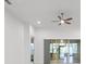 Bright living room with tile floors, ceiling fan, and sliding glass doors offering lots of natural light at 780 Mystic Hill Ct, Kissimmee, FL 34759