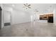 Open-concept living area with tile flooring, ceiling fans, recessed lights, kitchen with island, and neutral walls at 780 Mystic Hill Ct, Kissimmee, FL 34759