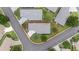 Aerial view highlighting the property's boundaries, showcasing the home, driveway, and surrounding yard space at 8608 Se 141St Street Rd, Summerfield, FL 34491