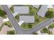 An aerial perspective of the home, capturing the roof, driveway, and surrounding neighborhood layout at 8608 Se 141St Street Rd, Summerfield, FL 34491