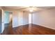 Neutral bedroom with connecting bathroom and spacious closet at 8705 Village Green Blvd, Clermont, FL 34711