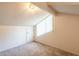 Loft area is brightly lit, and features neutral carpet, a window with coverings and a closet at 8705 Village Green Blvd, Clermont, FL 34711