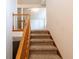 Carpeted stairs ascending to a landing at 8705 Village Green Blvd, Clermont, FL 34711